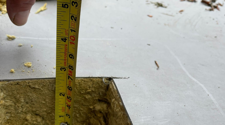 Flat roof survey taking place
